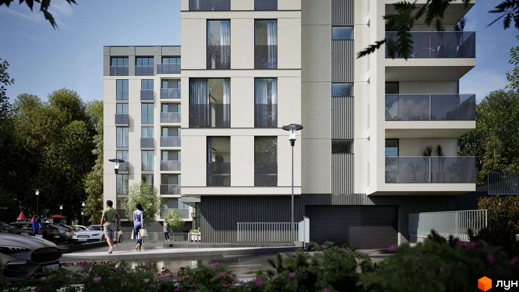 Зовнішній вигляд житлового комплексу Lumierra Residence з балконами та вікнами. Прибудинкова територія з автомобілями та деревами.