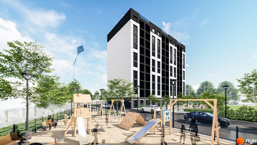 Житловий комплекс Квартал №5 з чорно-білим фасадом. На передньому плані дитячий майданчик з дерев'яними елементами, поруч дерева та дорога.