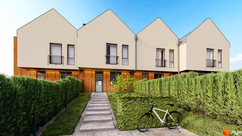 Таунхаус Soul House з бежевим фасадом та дерев'яними елементами, перед яким розташована зелена огорожа та велосипед.
