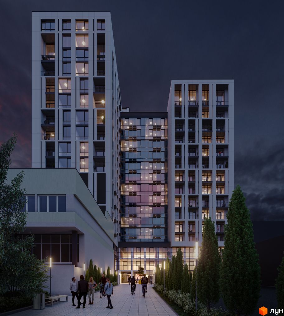 Апарт-комплекс WELL towers з багатою прибудинковою територією та людьми на фоні вечірнього неба. Зовнішній вигляд будинку з багатьма вікнами та балконами.