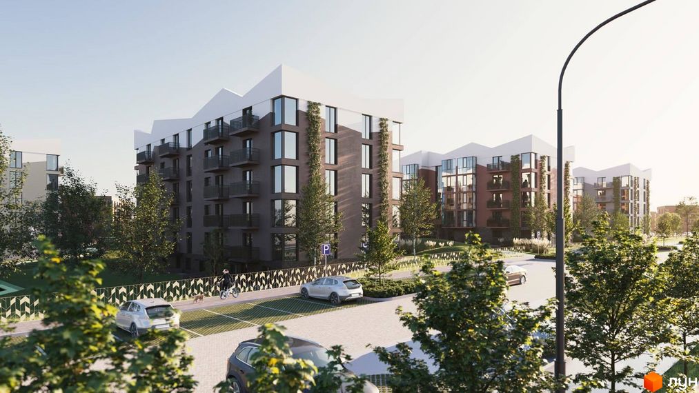 Житловий комплекс Гордість: фасади будівель з балконами та великими вікнами, зелена прибудинкова територія з парковкою та пішохідними доріжками.