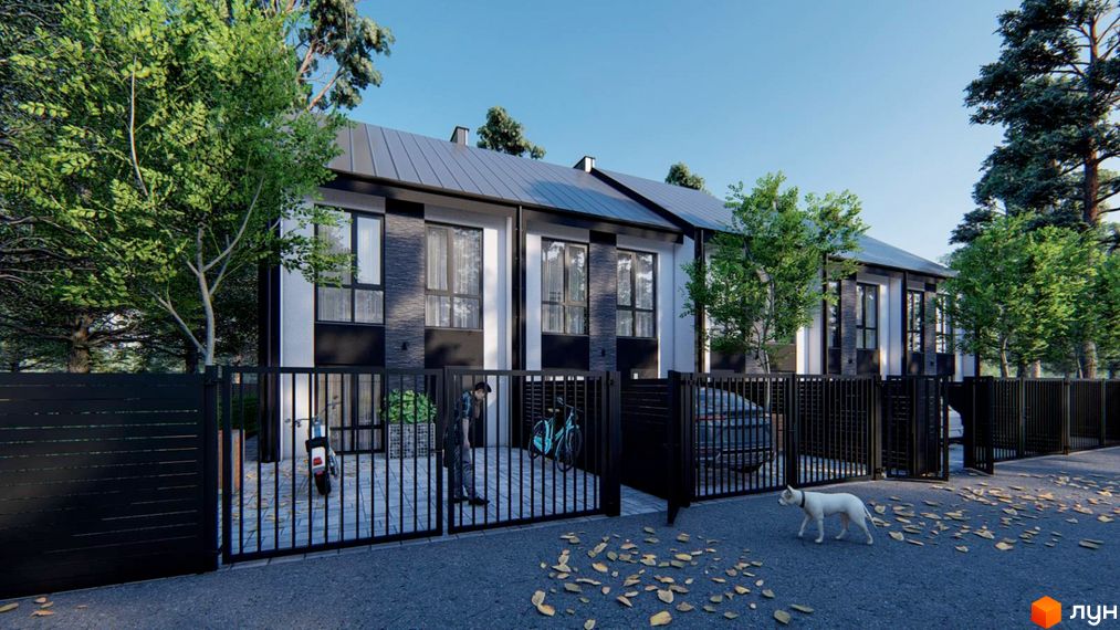 Будинки Житлового комплексу на вул. Кленова, 67: фасади з темними вставками, огорожа, бруківка та дерева.