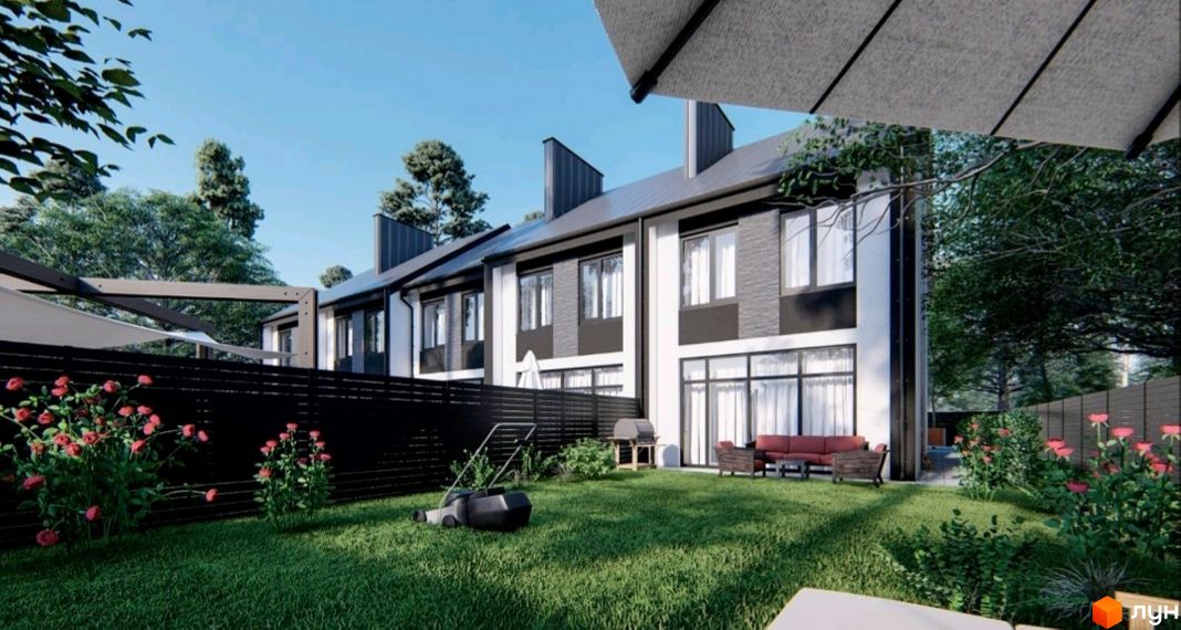 Сучасний житловий комплекс на вул. Кленова, 67, з доглянутим заднім двором та квітучими рослинами.