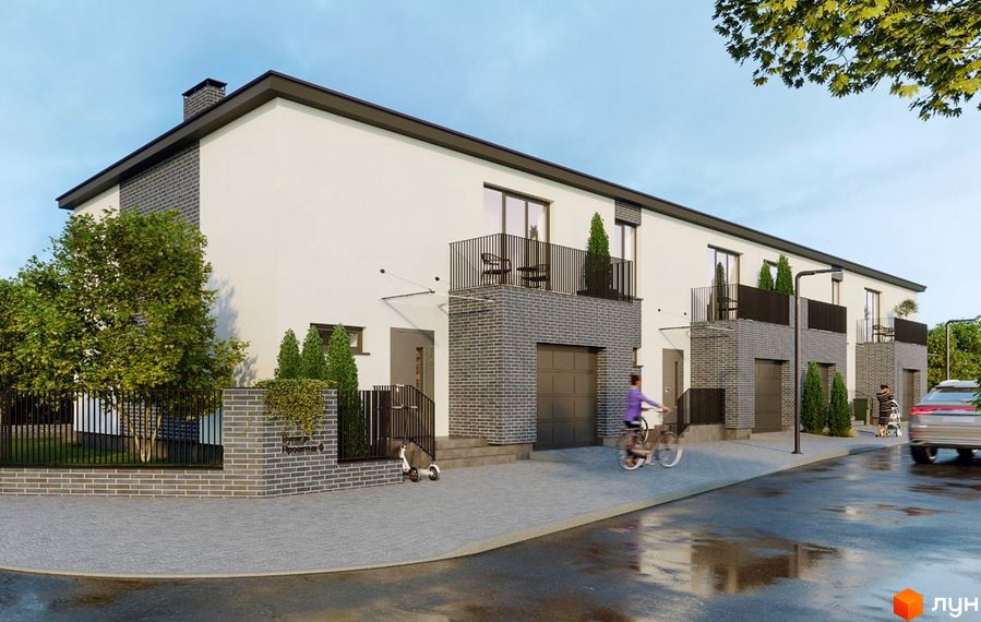 Зовнішній вигляд триповерхових будинків з балконами та гаражами на вул. Гайдея, 10. Прибудинкова територія з деревами та парканом.