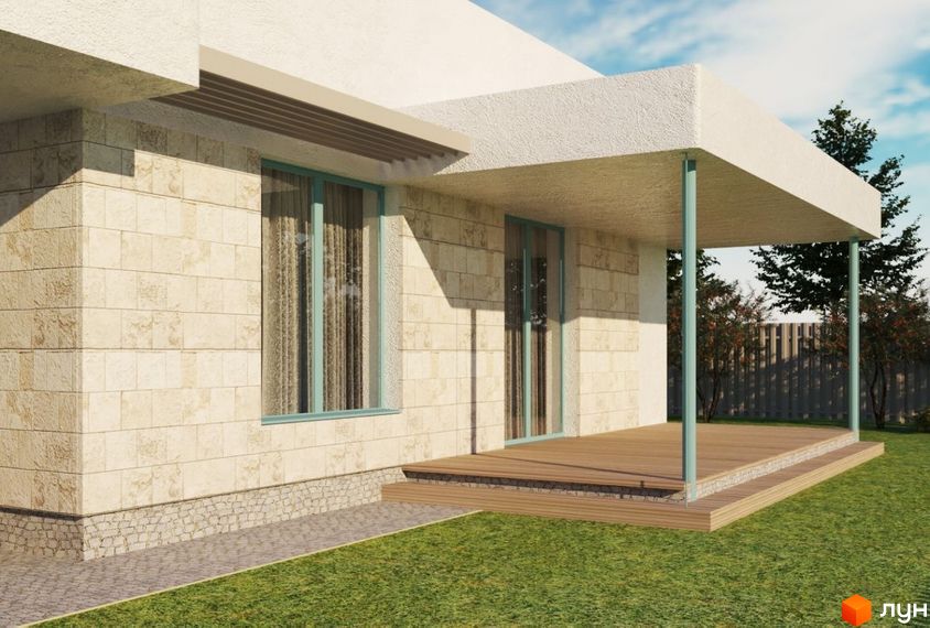 Котеджне містечко Чапаєвка: будинок з кам'яним фасадом та дерев'яною терасою, оточений зеленою галявиною.