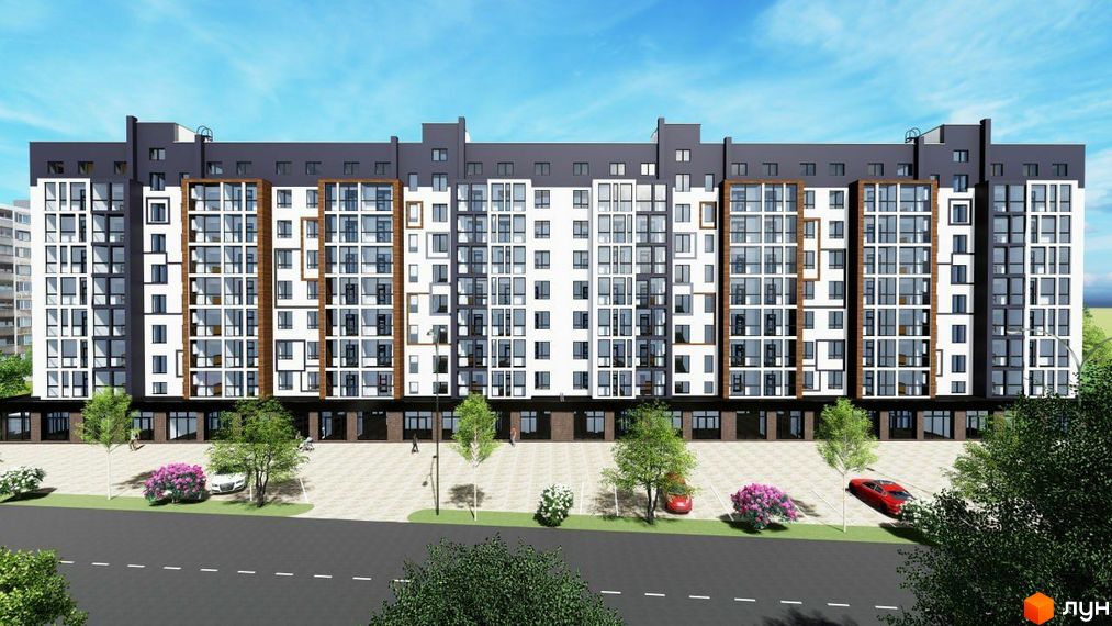 Фасад житлового комплексу Болгарський з великою кількістю вікон та балконів. Перед будинком розташована прибудинкова територія з деревами, кущами та автомобілями.