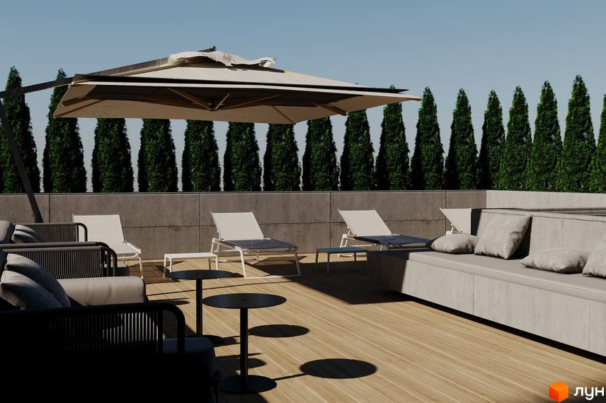 Простір для відпочинку на терасі Житлового комплексу Prestige Palace з садовими меблями та рядами дерев.