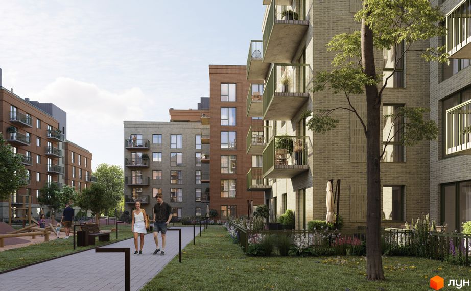 Житловий комплекс WAWEL з цегляним фасадом та балконами, зеленою прибудинковою територією та дитячим майданчиком.