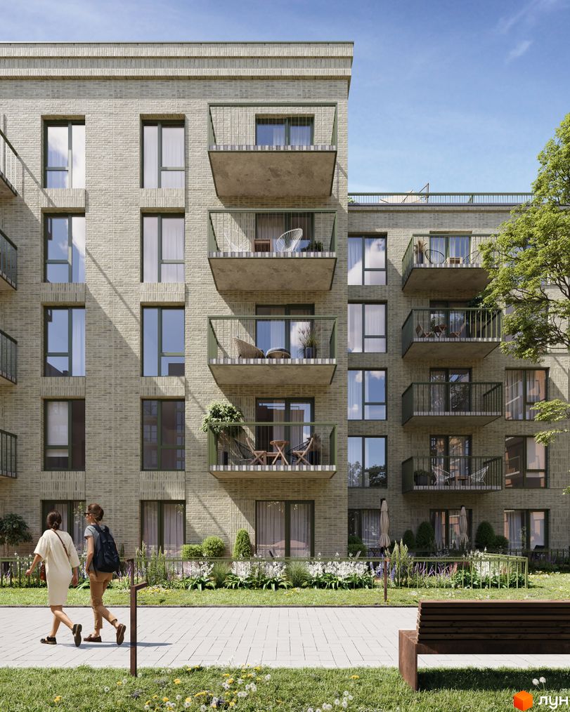 Зовнішній вигляд новобудови ЖК WAWEL з цегляним фасадом та балконами. Прибудинкова територія з доглянутим газоном, квітами та пішохідною доріжкою.