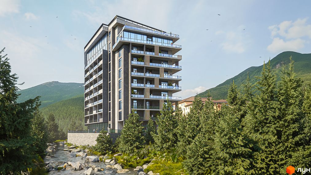 Апарт-комплекс KARDAMON RESORT & SPA з панорамними вікнами та балконами на тлі гірського пейзажу та річки.