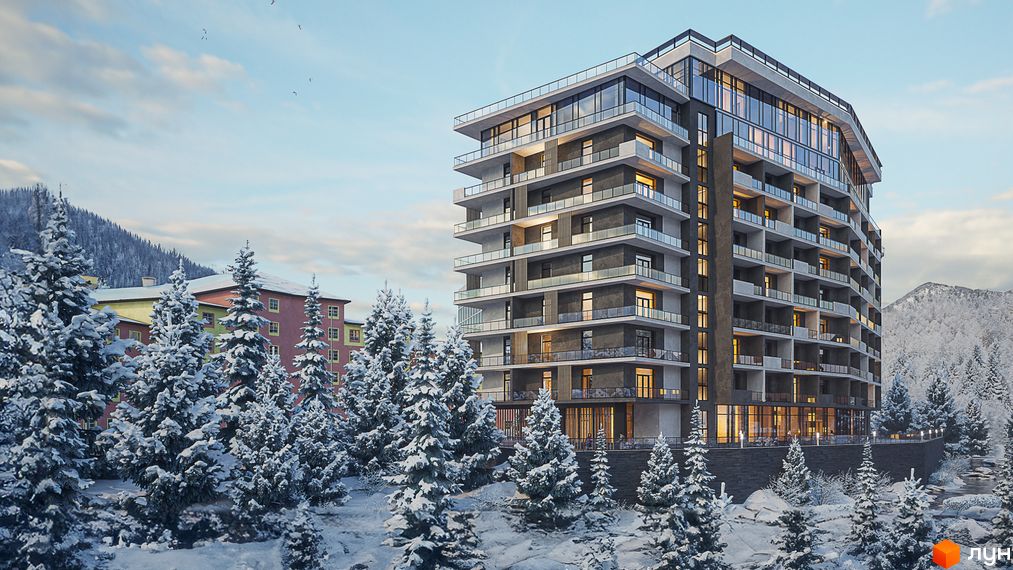 Апарт-комплекс KARDAMON RESORT & SPA у Карпатах, зимовий пейзаж з ялинами та гірським масивом.