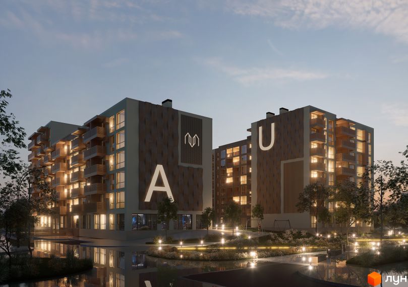 Новобудова AUROOM DISTRICT: багатоповерхові будинки з балконами та темними фасадами, що мають великі літери. Освітлена територія з зеленими насадженнями та водоймою.